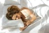 Saatva Latex Pillow lifestyle woman sleeping